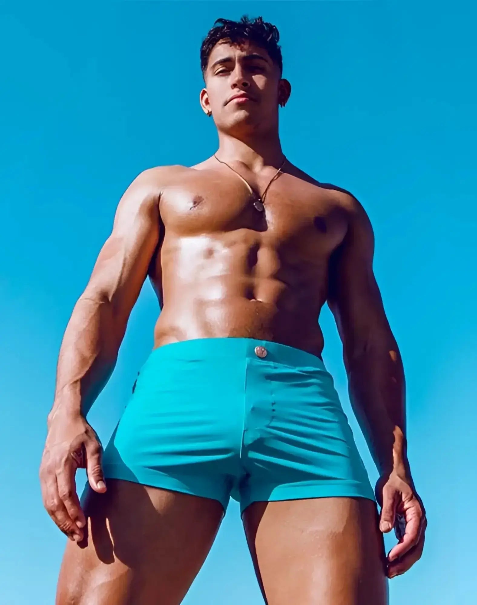 Vibrant turquoise 2eros v60 bondi series 2 swim trunks with single button closure in breeze green color