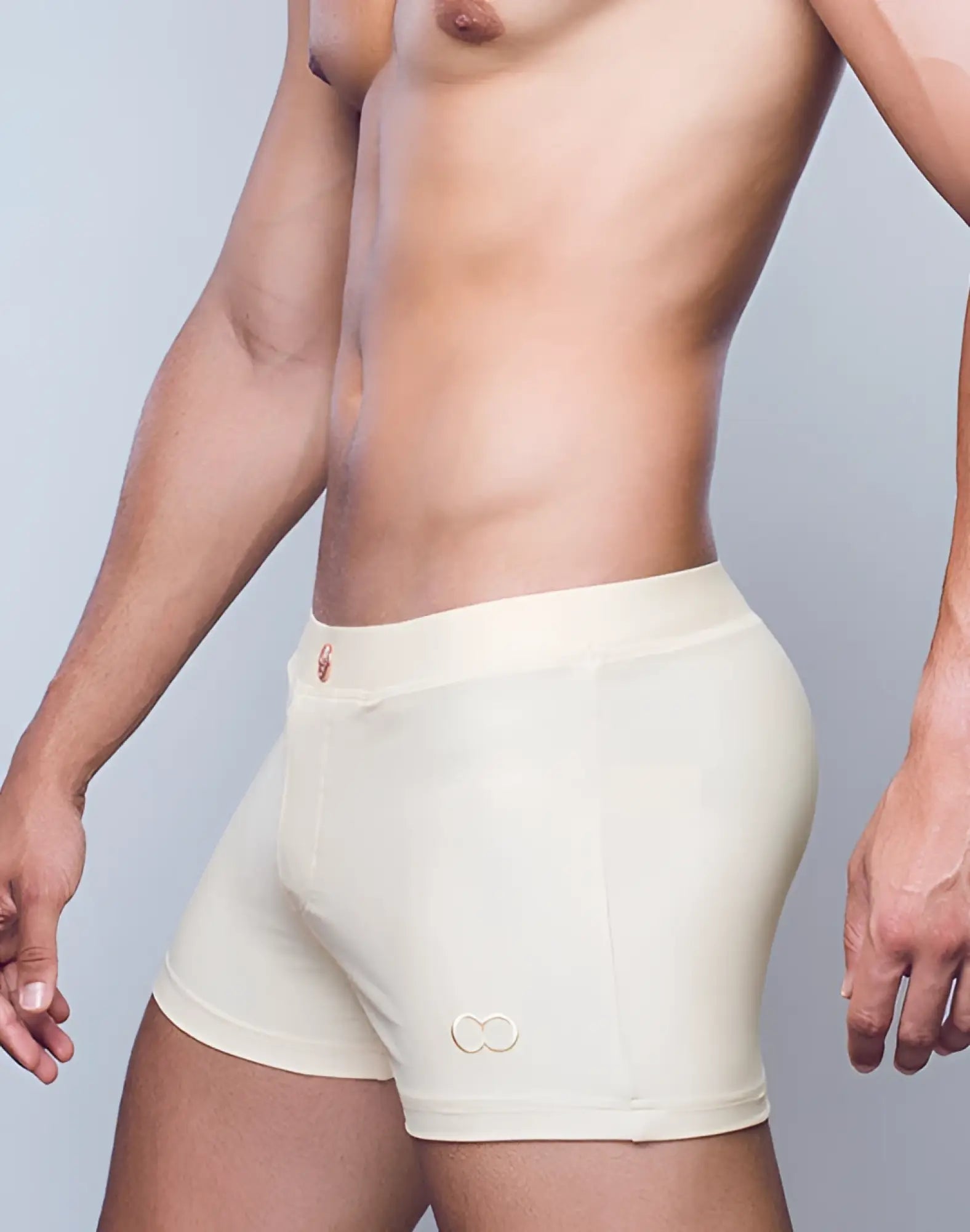 Cream-colored seamless 2EROS V60 Bondi series 2 boxer briefs with subtle infinity logo on lower right leg