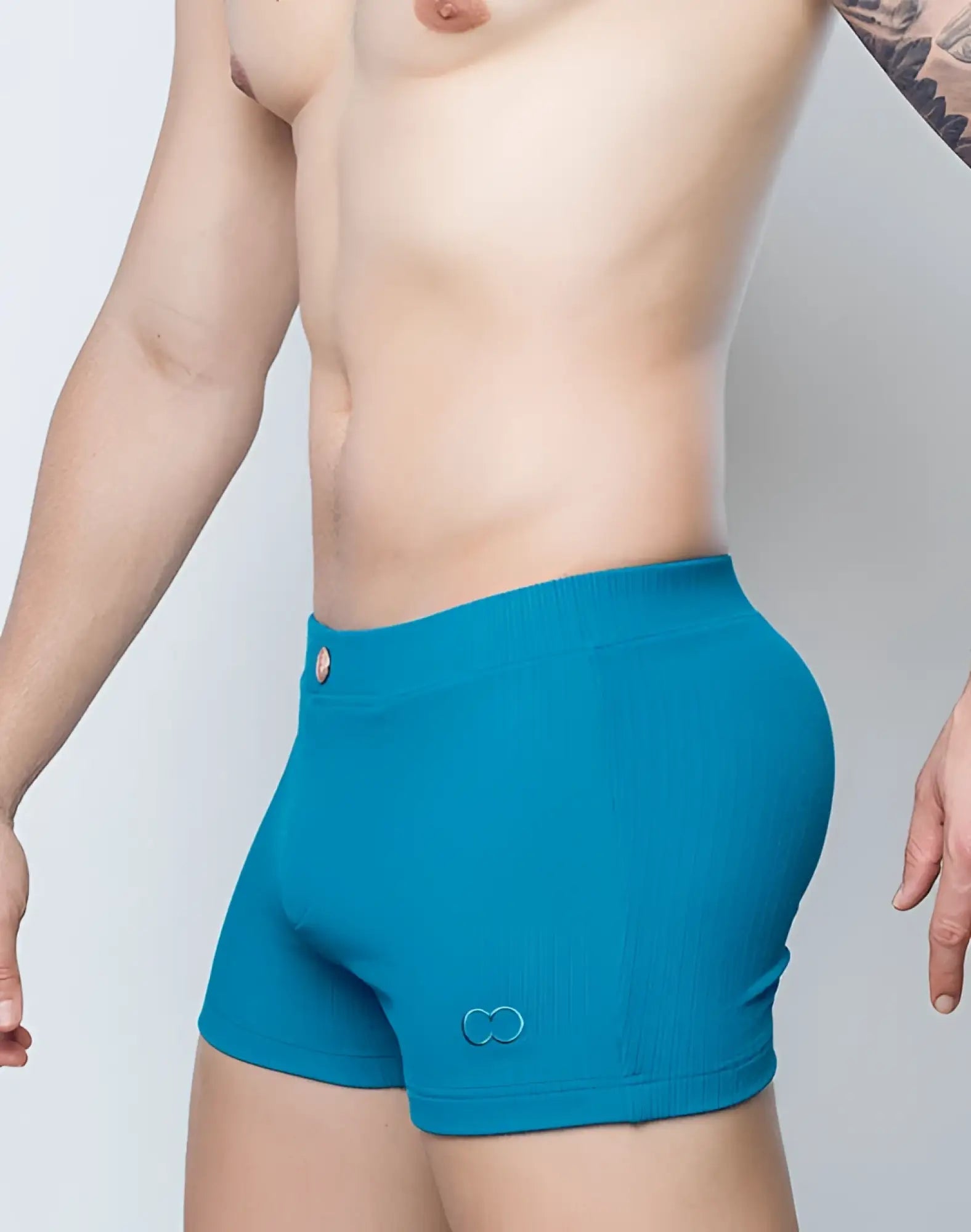 2eros v60 swim trunks in railroad teal feature turquoise ribbed knit boxer briefs with a small embroidered logo on the leg