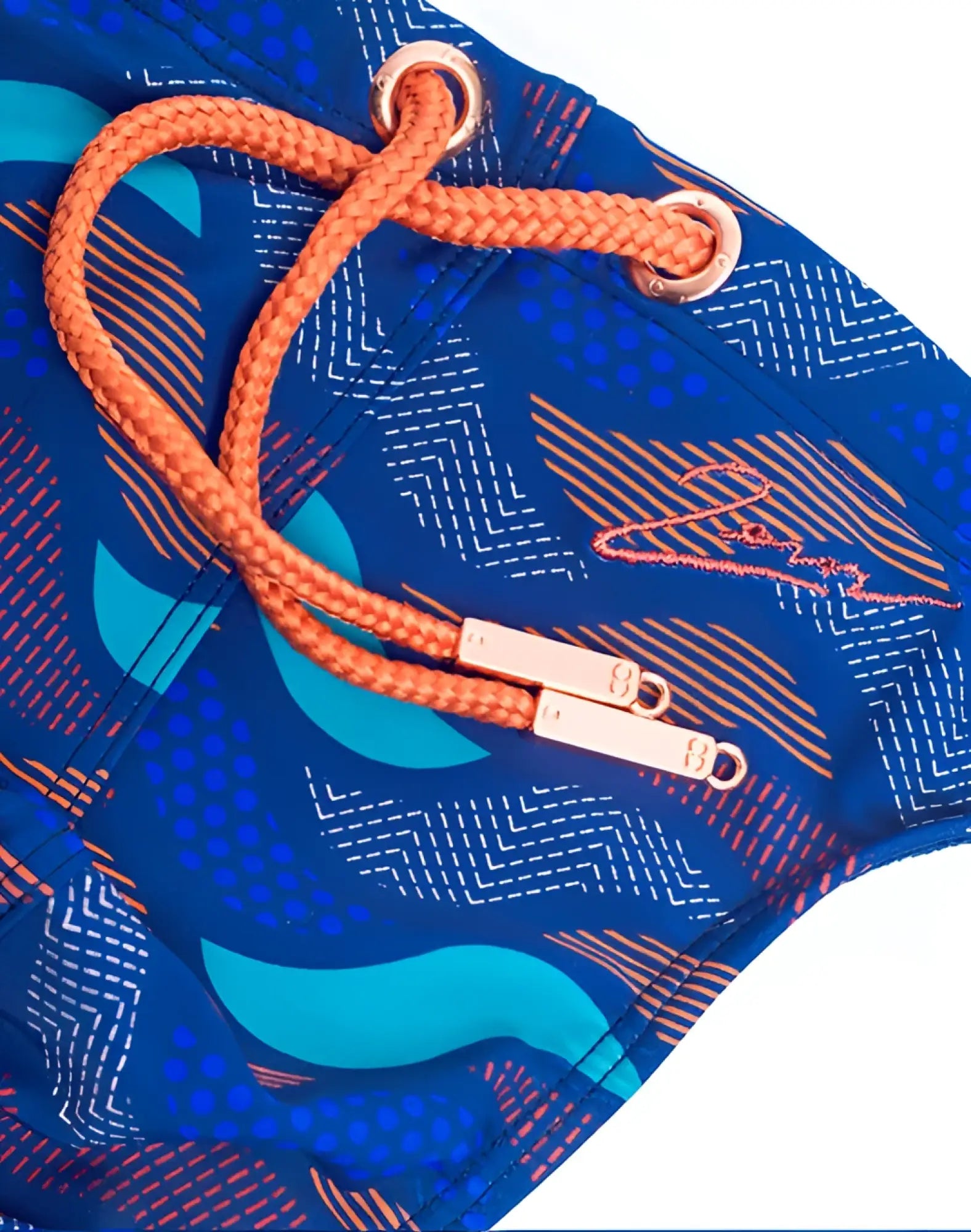 2eros v80 print swim thong in ocean blue with blue pattern orange braided drawstring and rose gold metal hardware