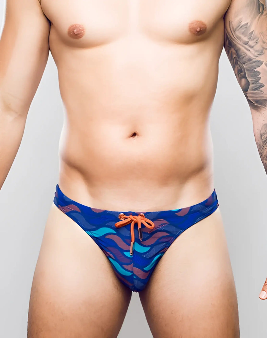 Blue patterned 2EROS V80 print swim thong with orange drawstring suitable for ocean and beach use