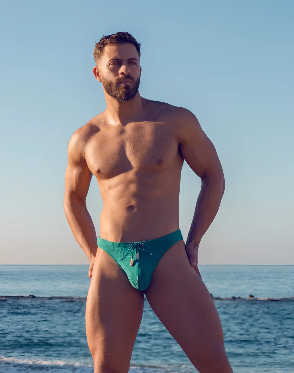 Teal 2EROS V80 textured swim thong with drawstring waistband designed for comfortable swimwear use