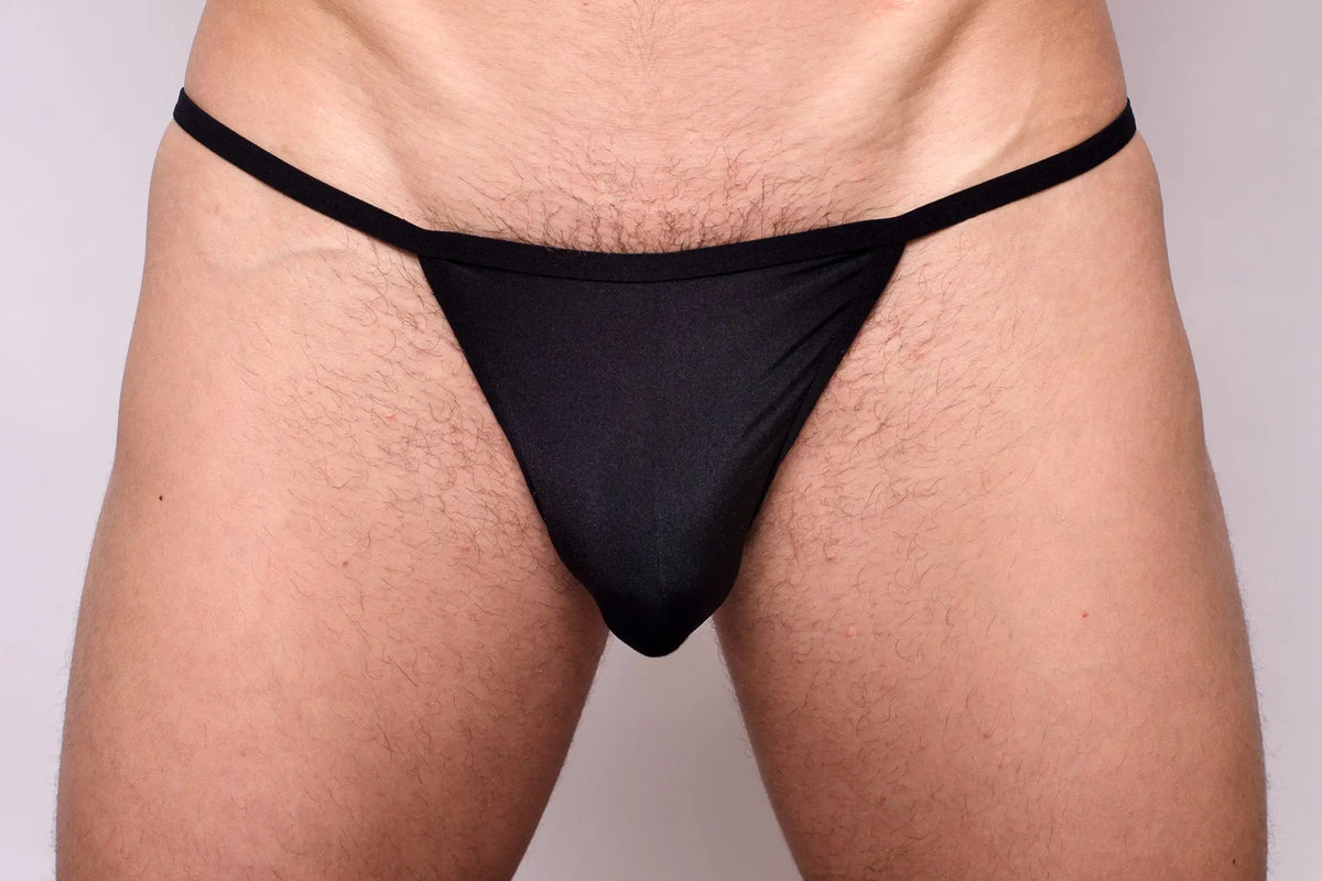 Black thong from 3-pack pride metro string bikini made of smooth stretchy fabric with a narrow waistband back view