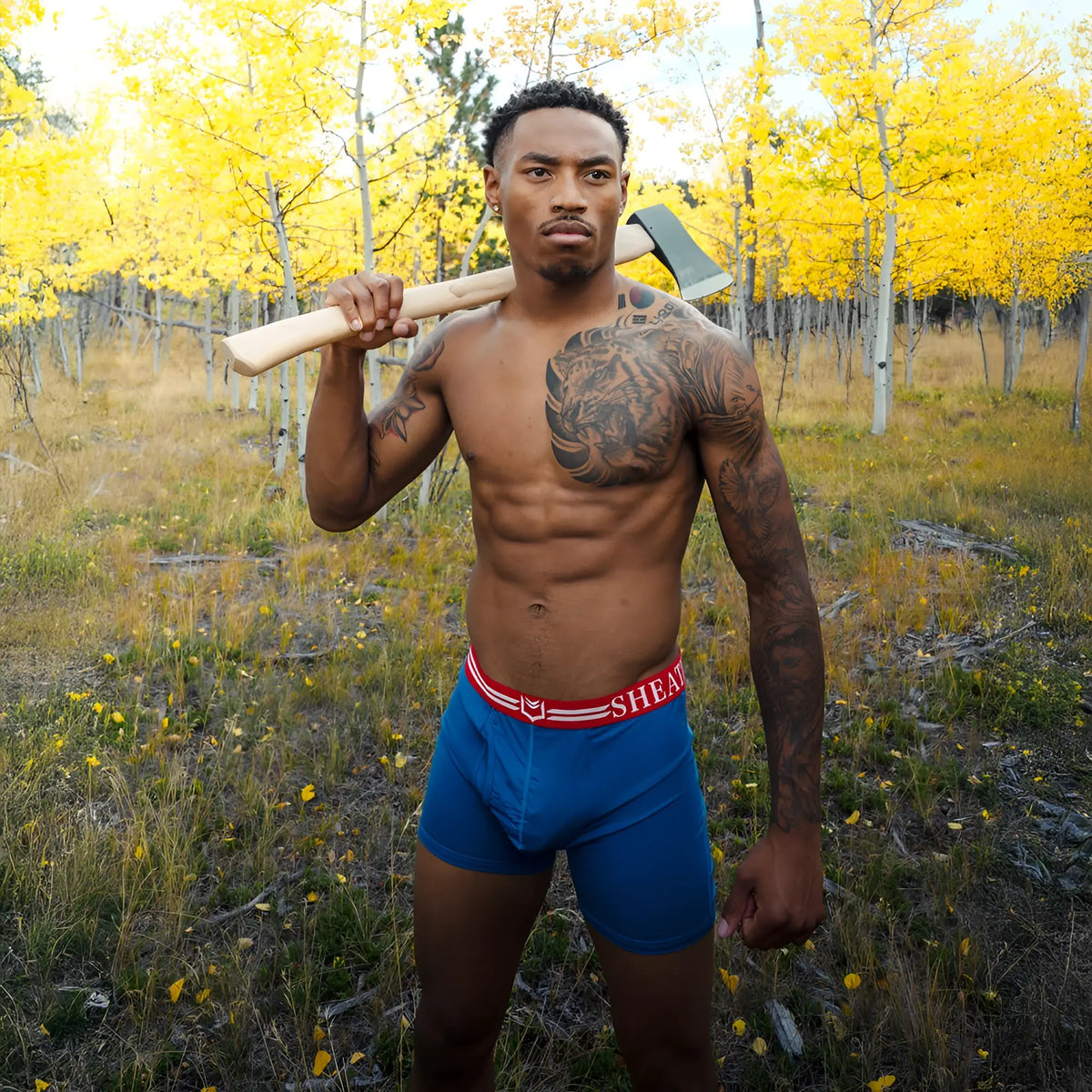 Blue boxer briefs with red waistband and shear branding from the sheath 4.0 best-seller dual pouch 3-pack bundle