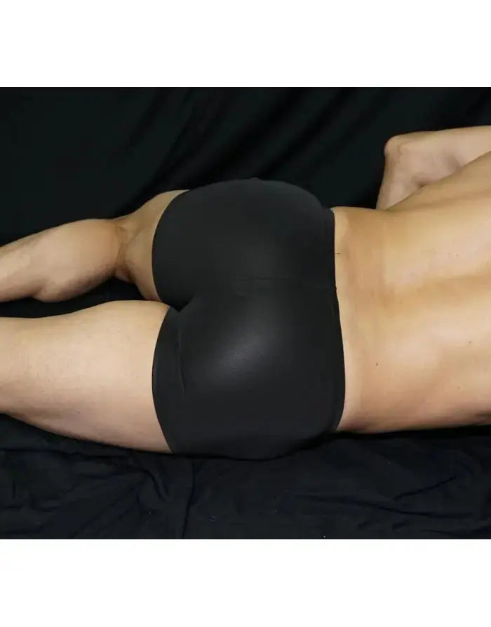 Black eco-leather boxer underwear by Arroyman featuring a smooth finish and a fitted design shown on a model from the back.