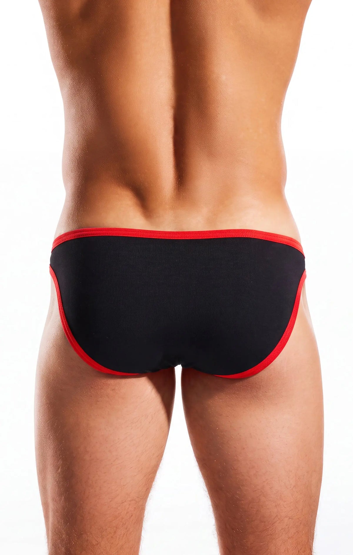 Rear view of a person in black briefs with red trim on white.