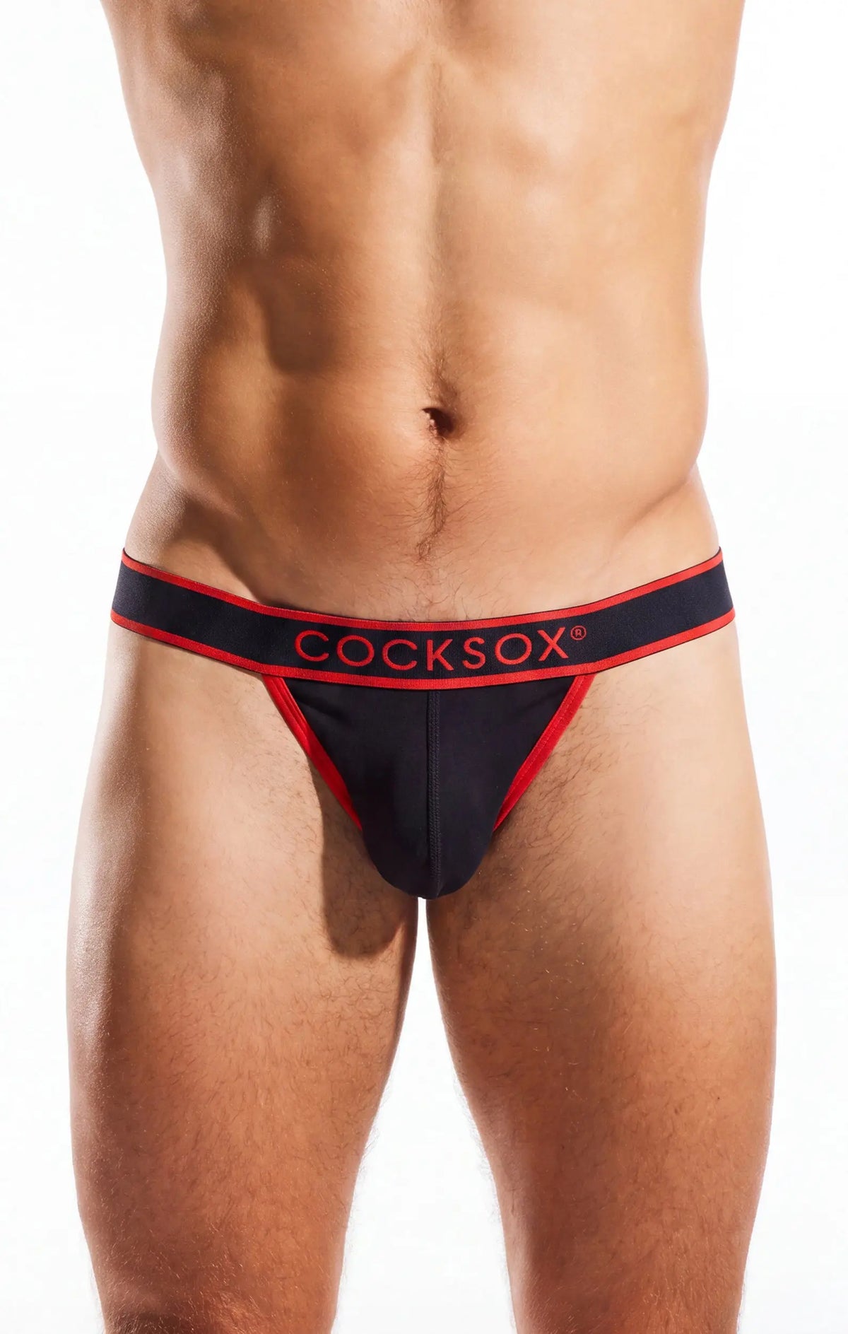 Torso and thighs of a person wearing black underwear with a red waistband, on a white background.