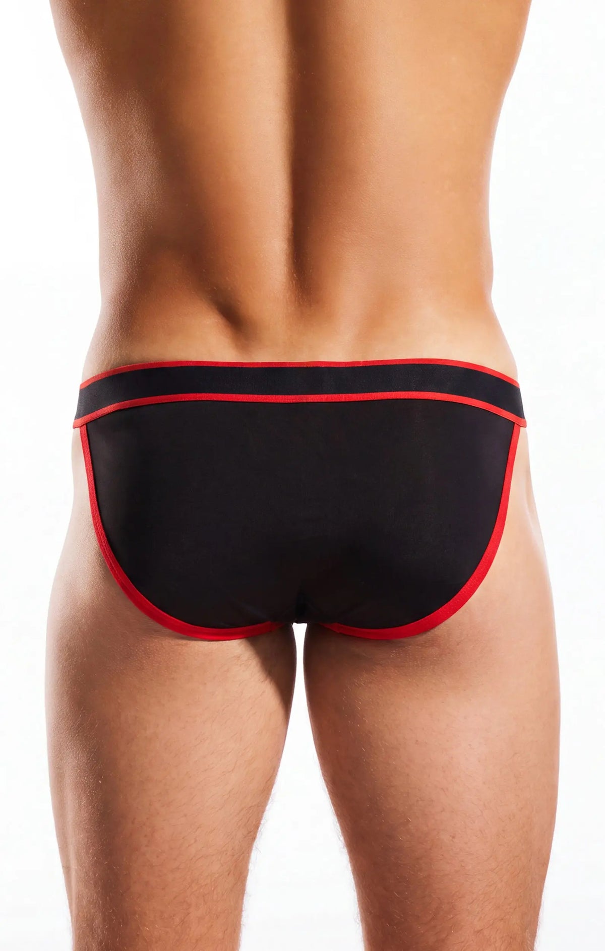 Rear view of a person wearing black underwear with red trim on a white background.