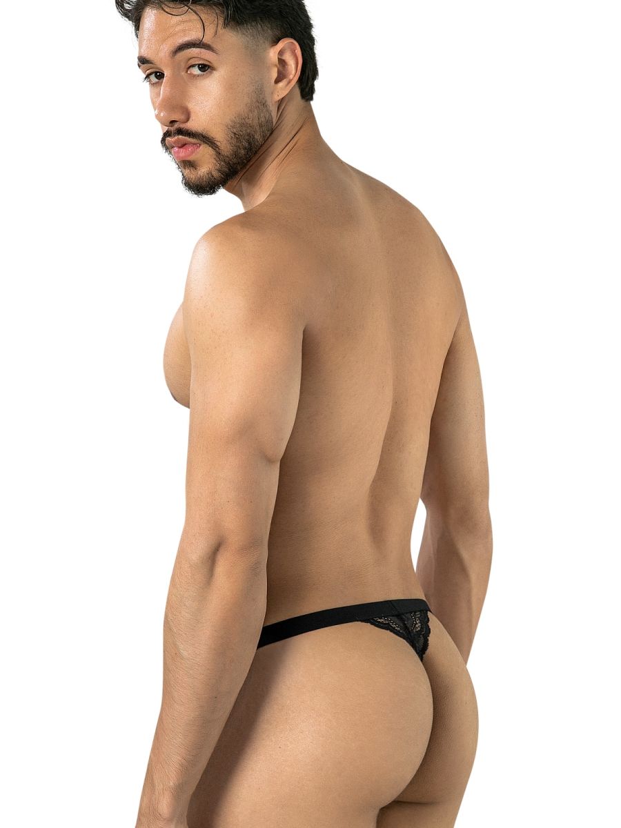 Man wearing black CandyMan lace thong, rear view on white background.