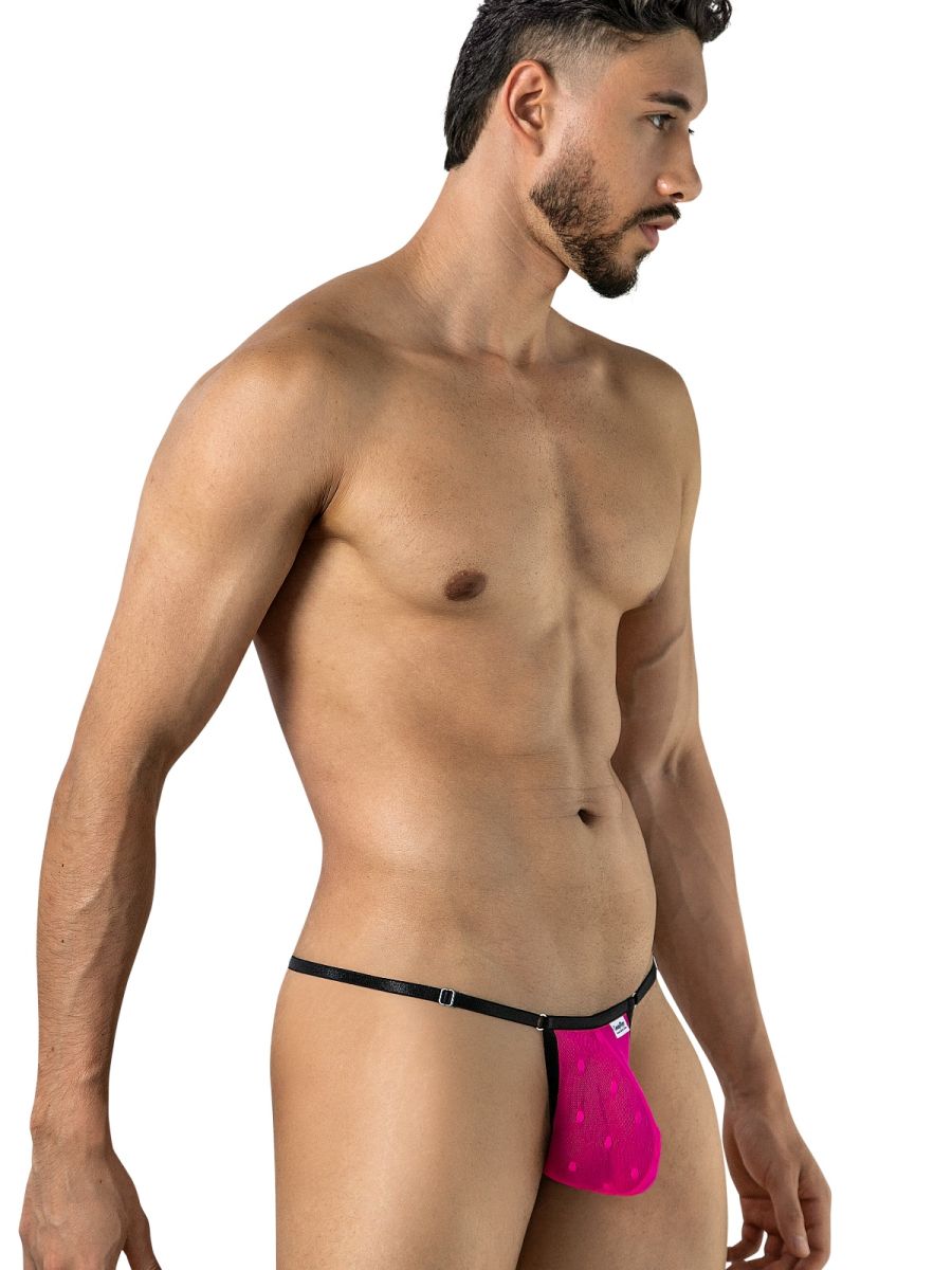 Angled front view of a model wearing CandyMan 95016 hot pink mesh thong with black straps.