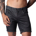 Front view of Gigo menâ€™s black denim short with belt loops, fly button, and contrast stitching on a tattooed model.