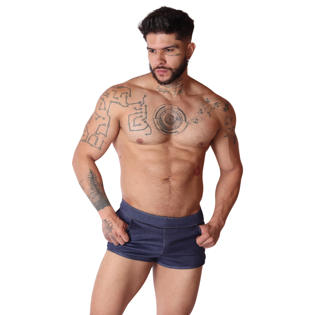 Front view of Gigo men's denim blue cotton fabric hot shorts with pocket detailing on a tattooed male model.
