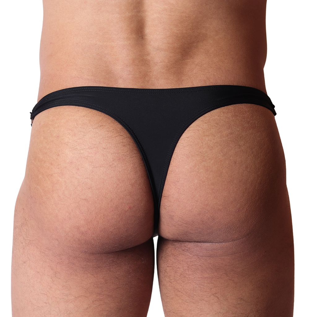 Back view of Gigo Dinamic black swim g-string in smooth fabric featuring minimalist, high-cut design.