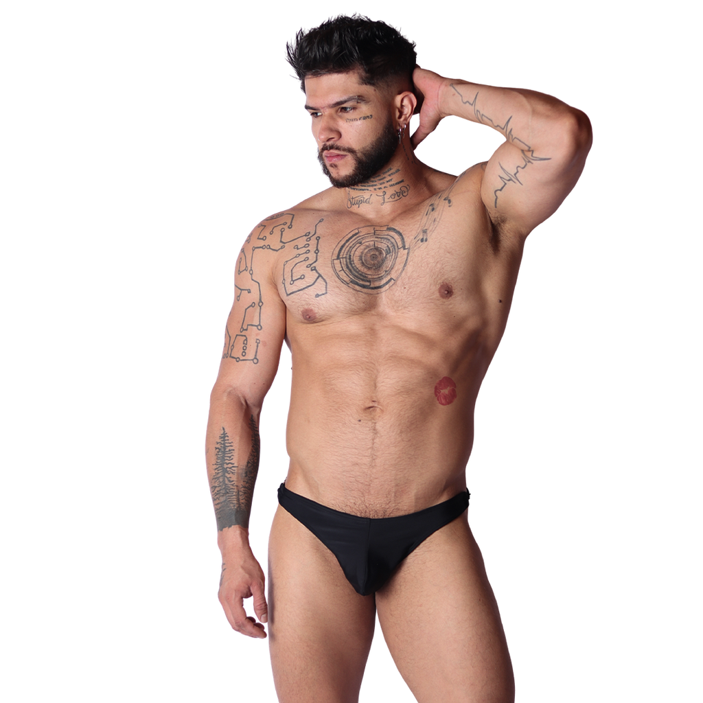 Front view of Gigo Dinamic black microfiber swim G-string featuring a sleek, minimalist design on a fit male model.