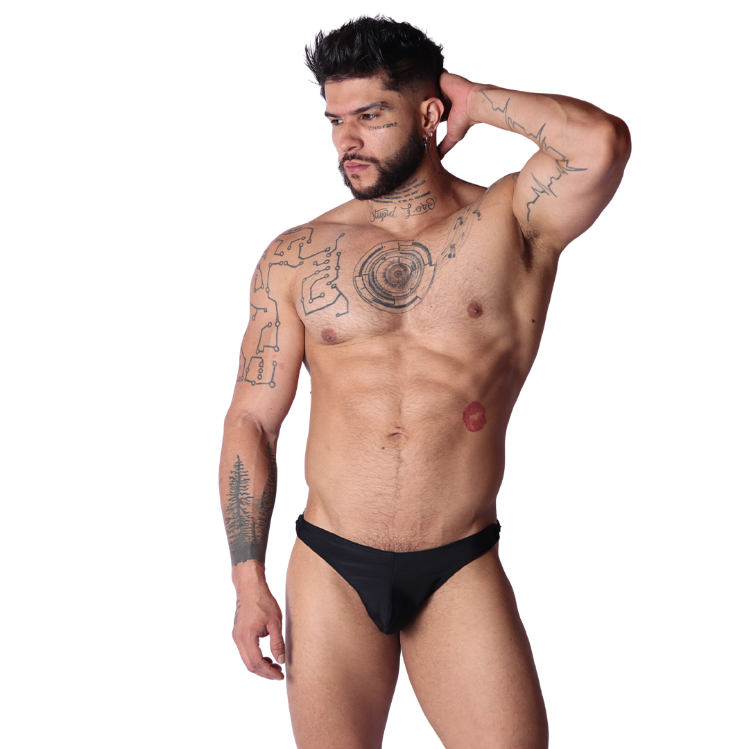 Front view of Gigo Dinamic black microfiber swim G-string featuring a sleek, minimalist design on a fit male model.