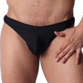 Front view of Gigo Dinamic black swim g-string in smooth, stretchy fabric with hand resting on hip.