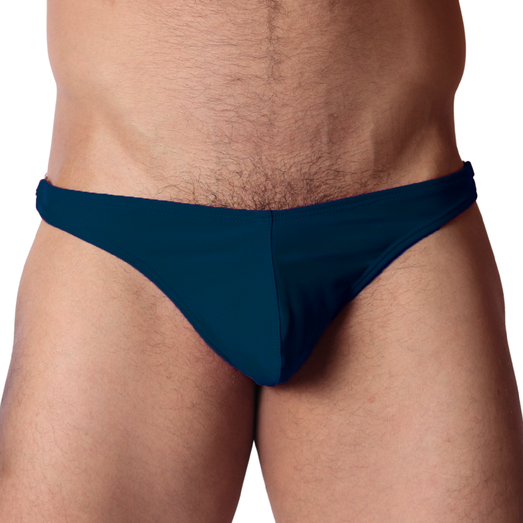 Front view of Gigo Dinamic green swim G-string in smooth, form-fitting fabric with a low-rise waistband.