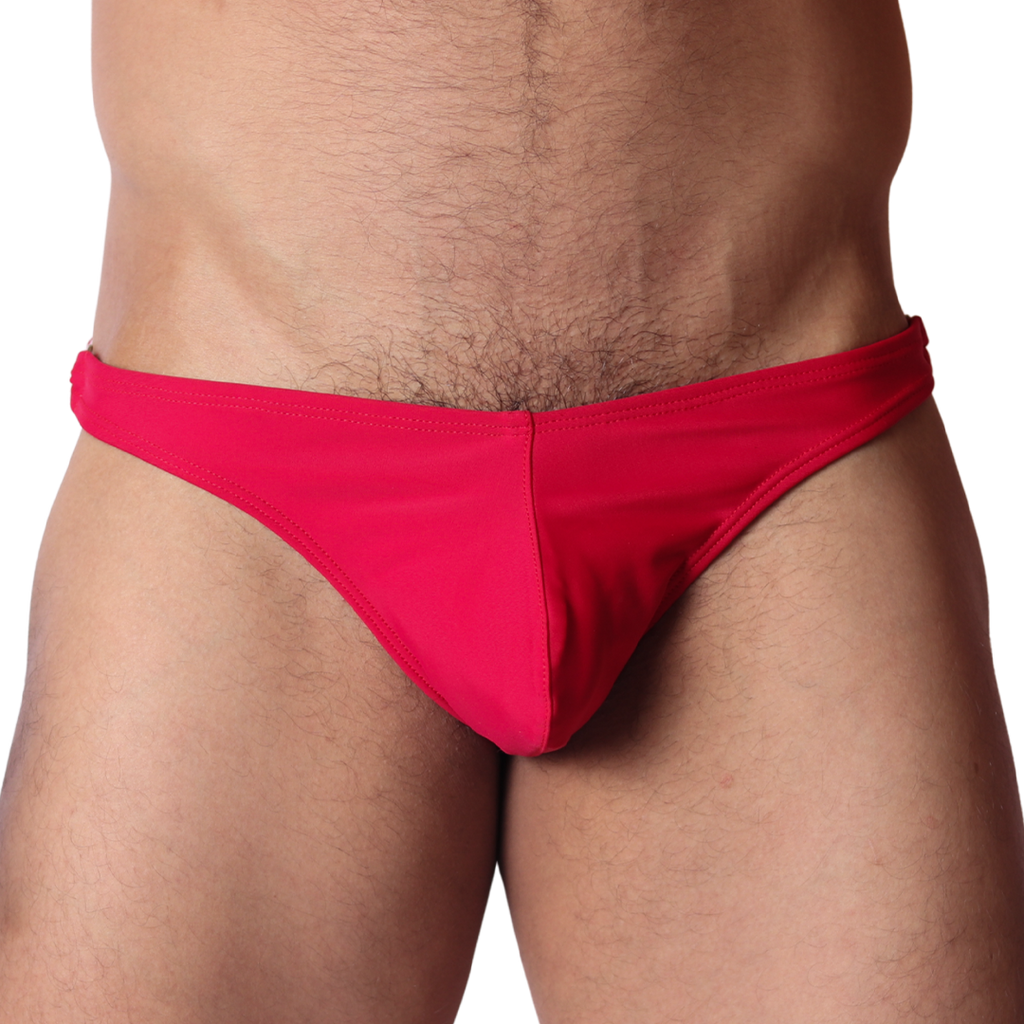 Front view of Gigo Dinamic red swim G-string in smooth, stretchy fabric with a center-seam pouch design.