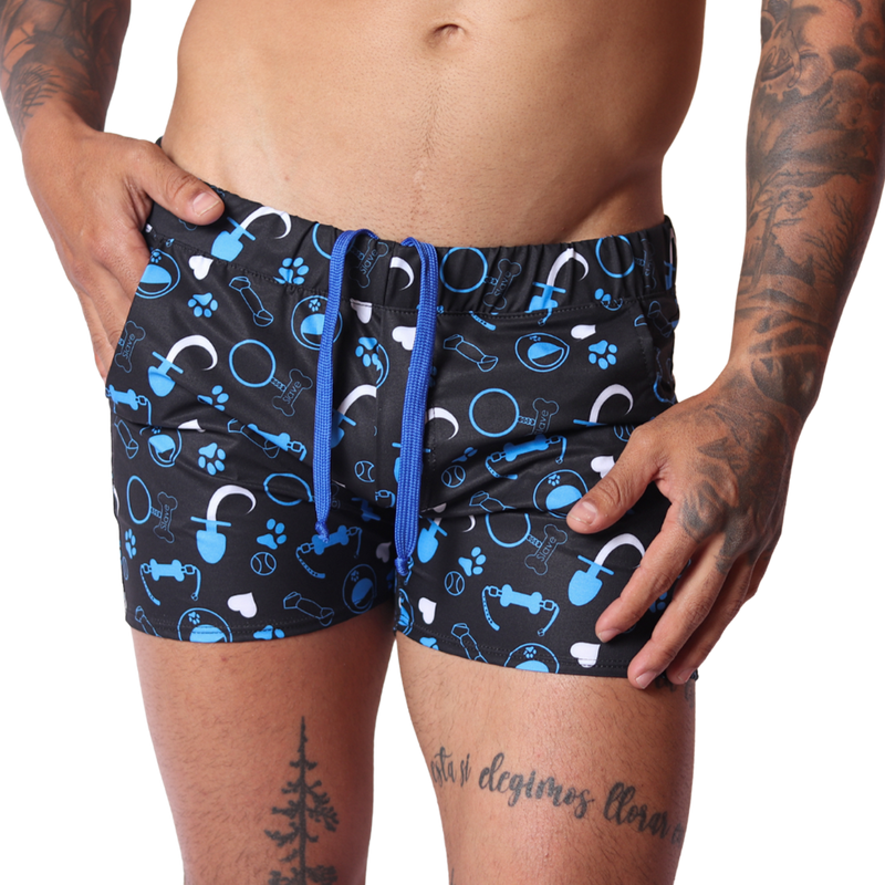 Front view of Gigo blue and black dog-themed print athletic fabric shorts with a drawstring waist.