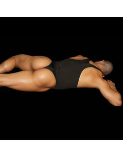 Black microfiber bodysuit thong by Arroyman featuring a sleek design and snug fit shown on a model from a side view.