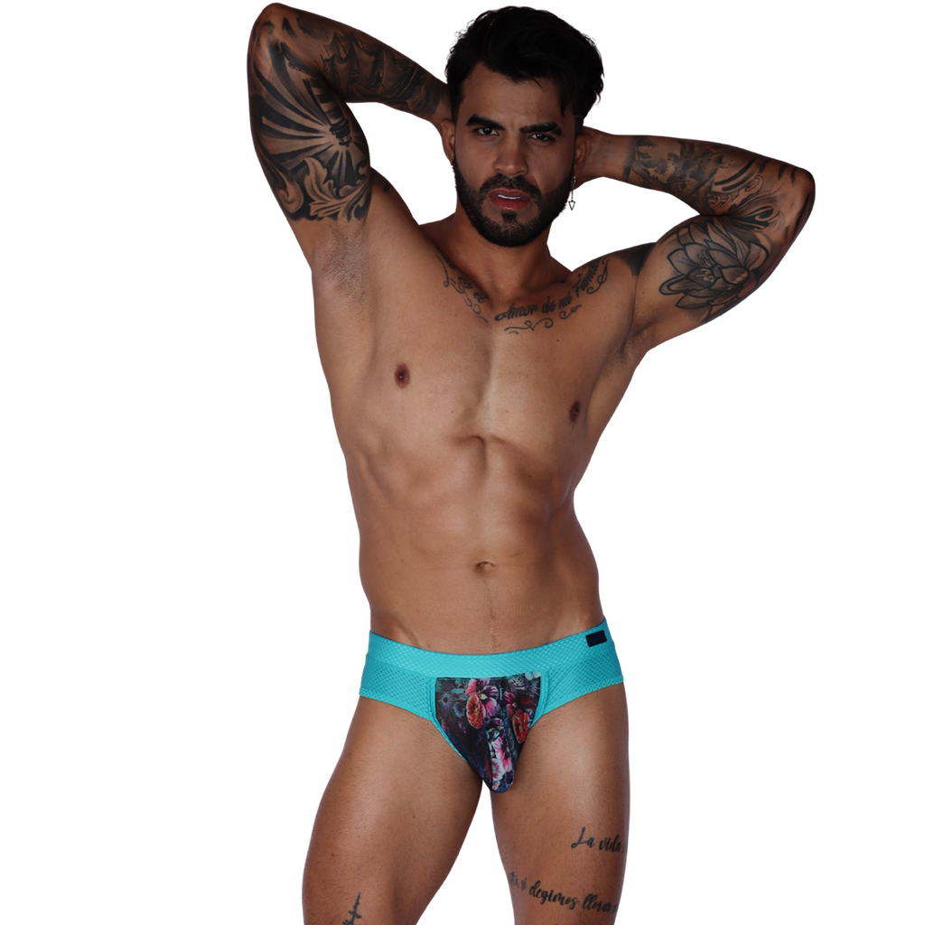 Gigo Garden Blue brief, front view. Blue mesh fabric with floral pouch detail, stylish athletic underwear for men.