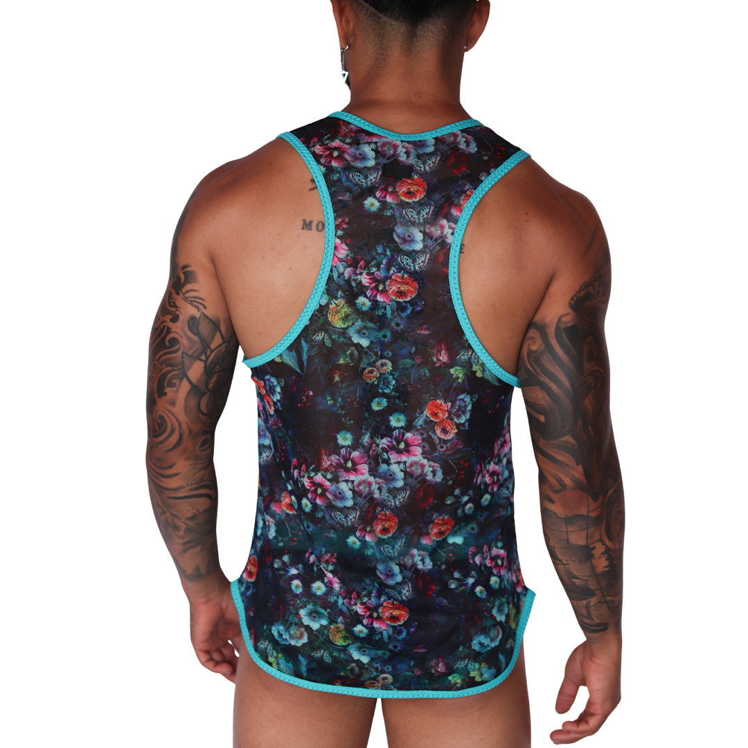 Back view of Gigo Garden Blue sheer mesh tank top with teal trim and vibrant floral print on a tattooed man.
