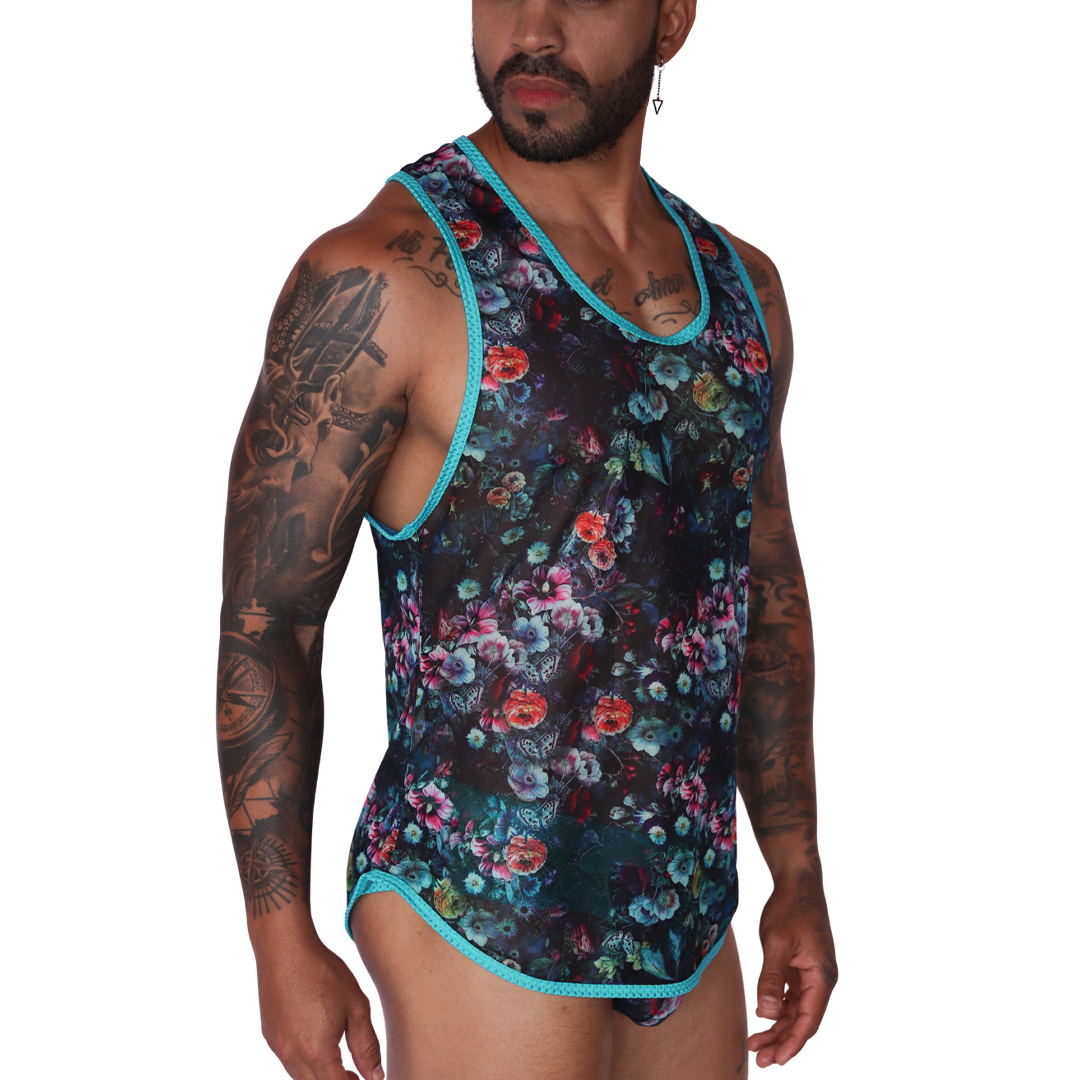 Side view of Gigo Garden Blue sheer mesh tank with floral print and teal trim.