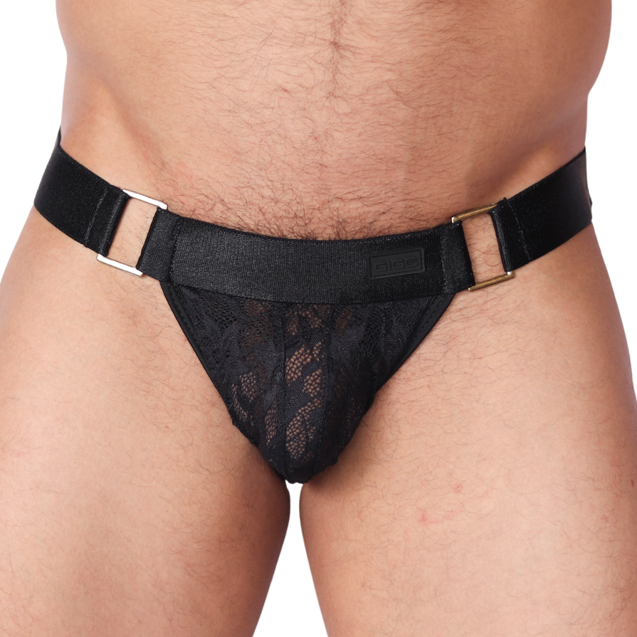 Front view of Gigo Illusion black lace jockstrap with metallic ring hardware and elastic waistband.