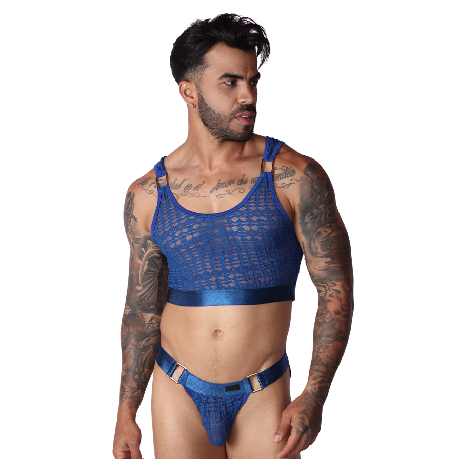 Front view of Gigo blue lace crop top with metallic elastic trim and gold ring details on a tattooed model.