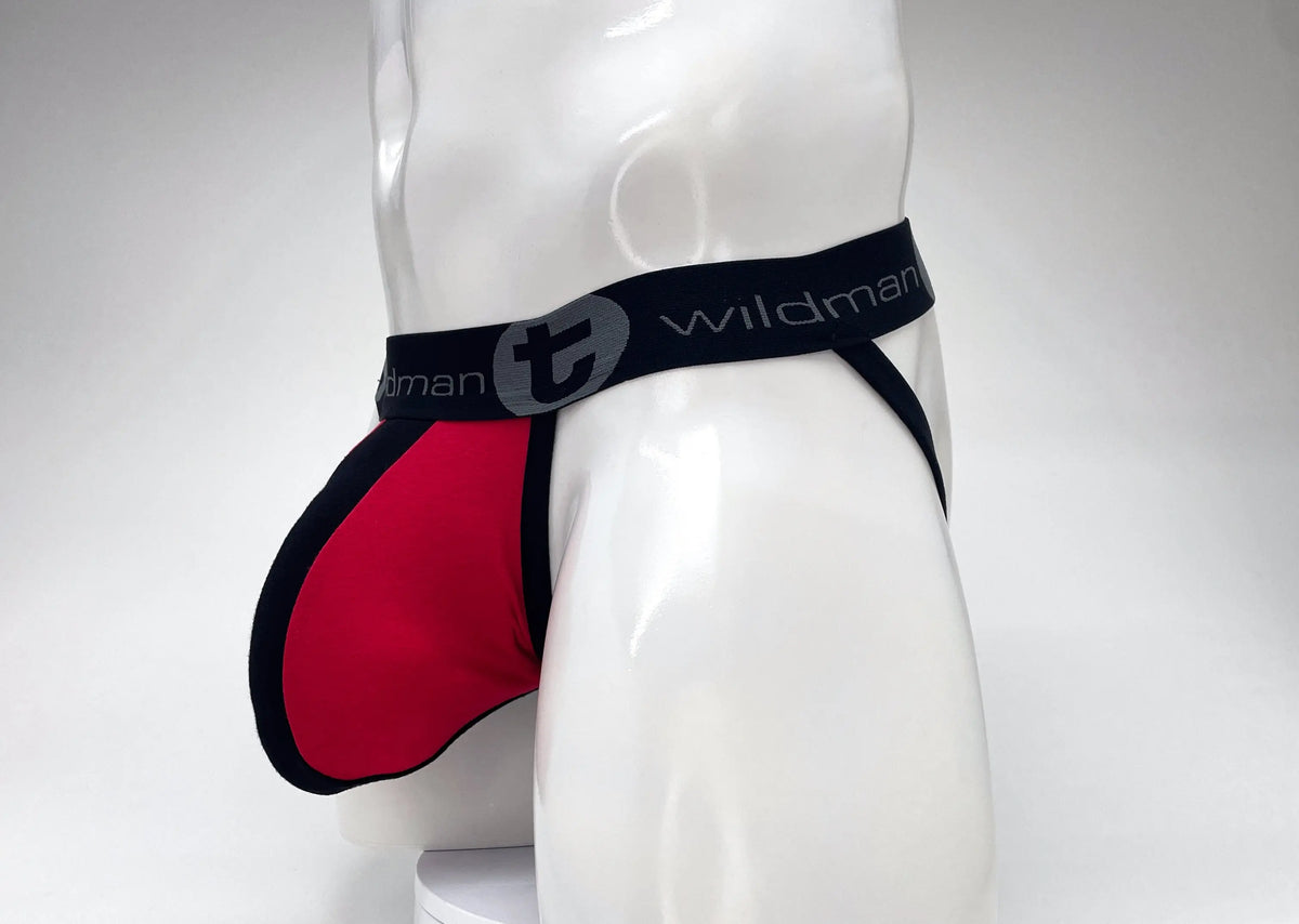 A white mannequin wearing a red and black underwear with a black waistband.