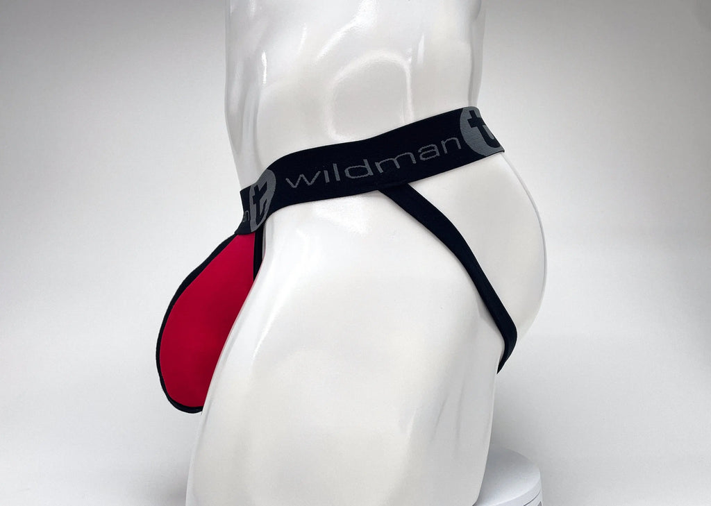 White mannequin wearing black underwear with red front panel.