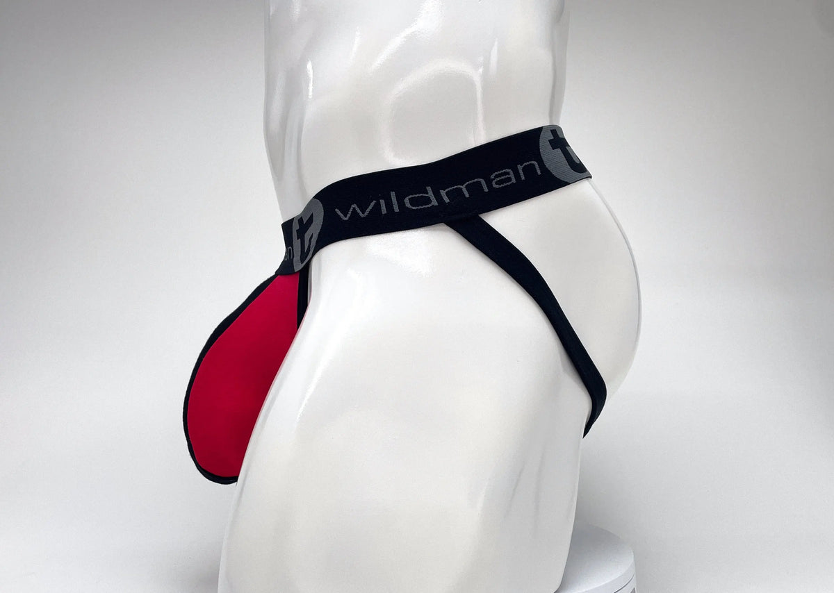 White mannequin wearing black underwear with red front panel.
