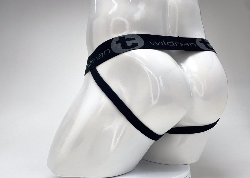 White mannequin rear wearing black underwear with gray logo text.