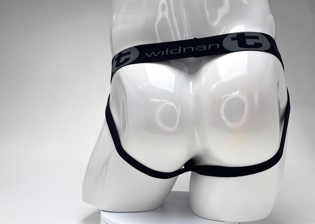 White mannequin rear wearing black underwear with gray text.
