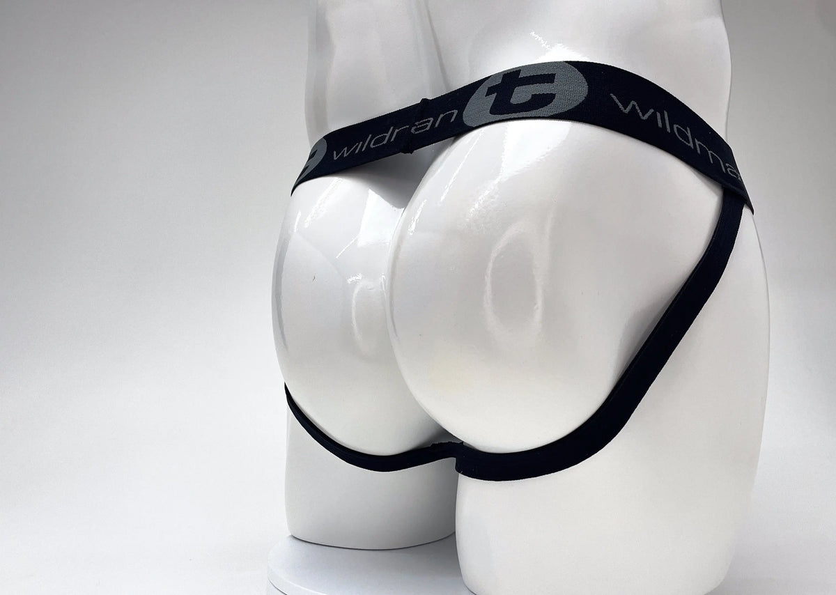 White mannequin rear wearing black underwear with gray text.
