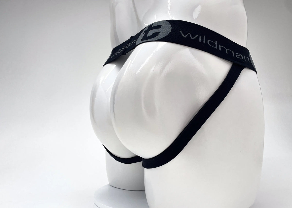 White mannequin rear view wearing black underwear with "Wildman" text.