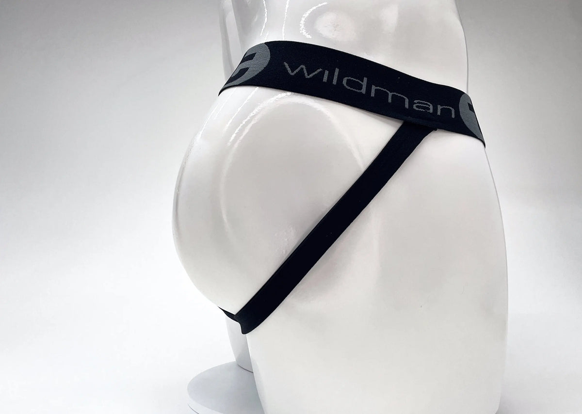 White mannequin rear wearing black underwear with gray "wildman" text.