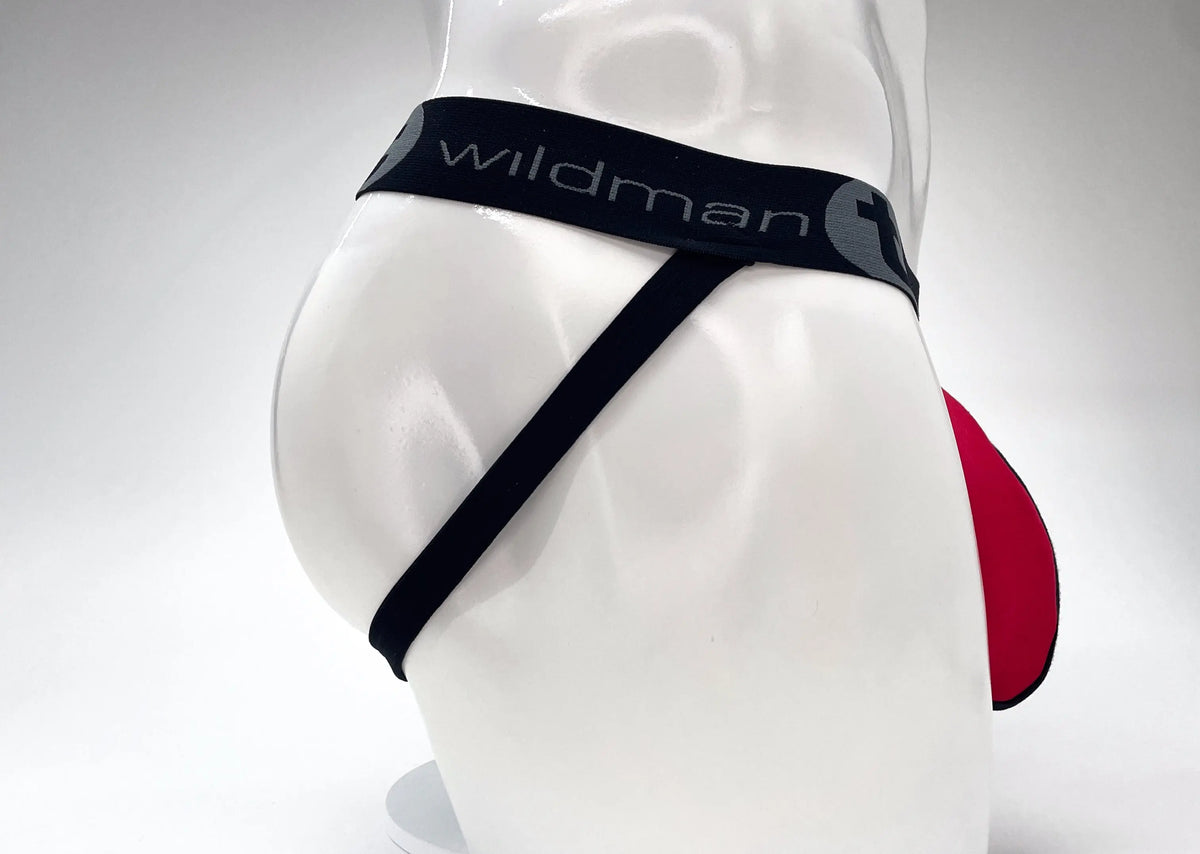 White mannequin rear wearing black underwear with "wildman" text and red pouch.