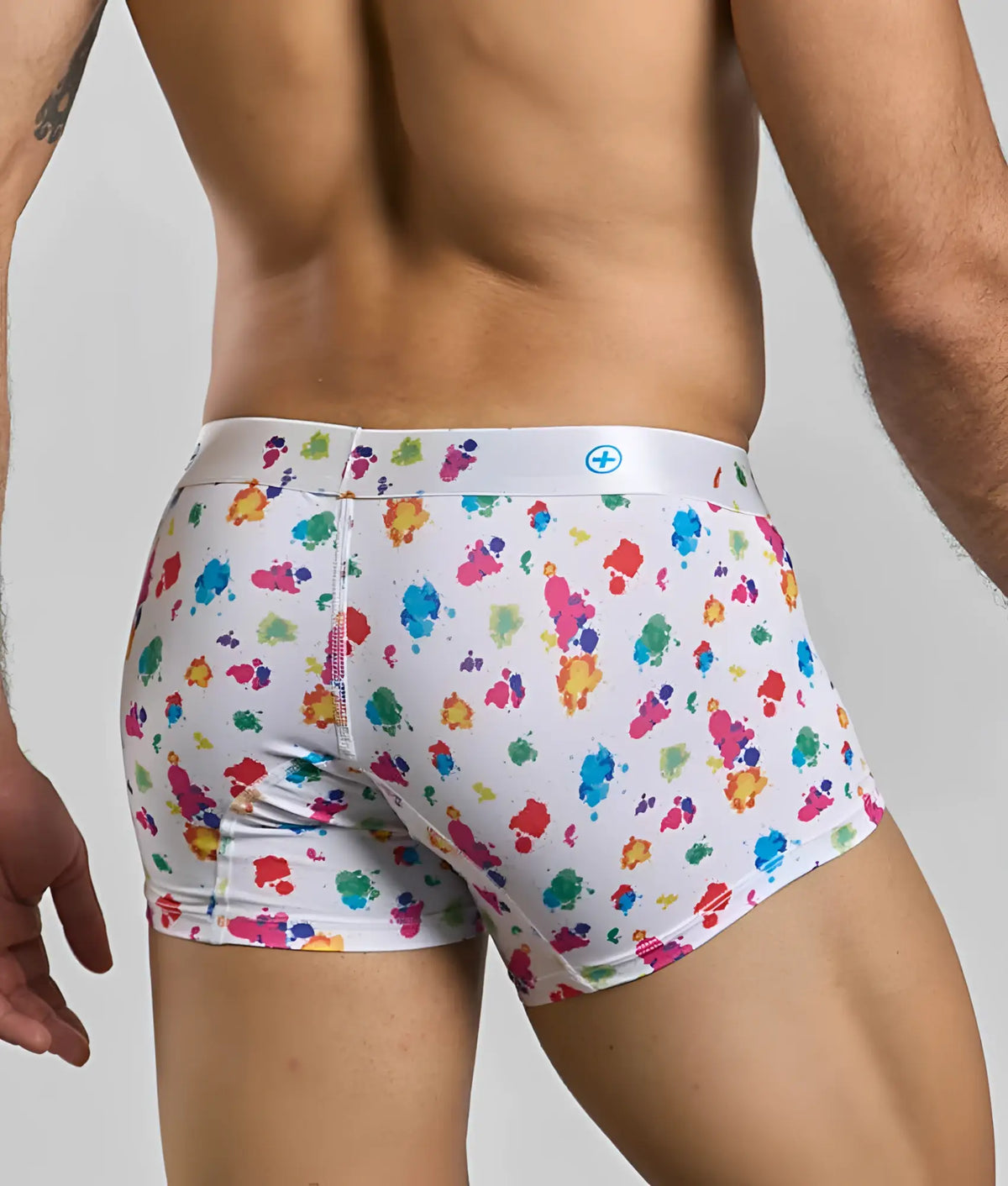 White boxer briefs malebasics trunk hipster with vibrant multicolored paint splatter pattern front view