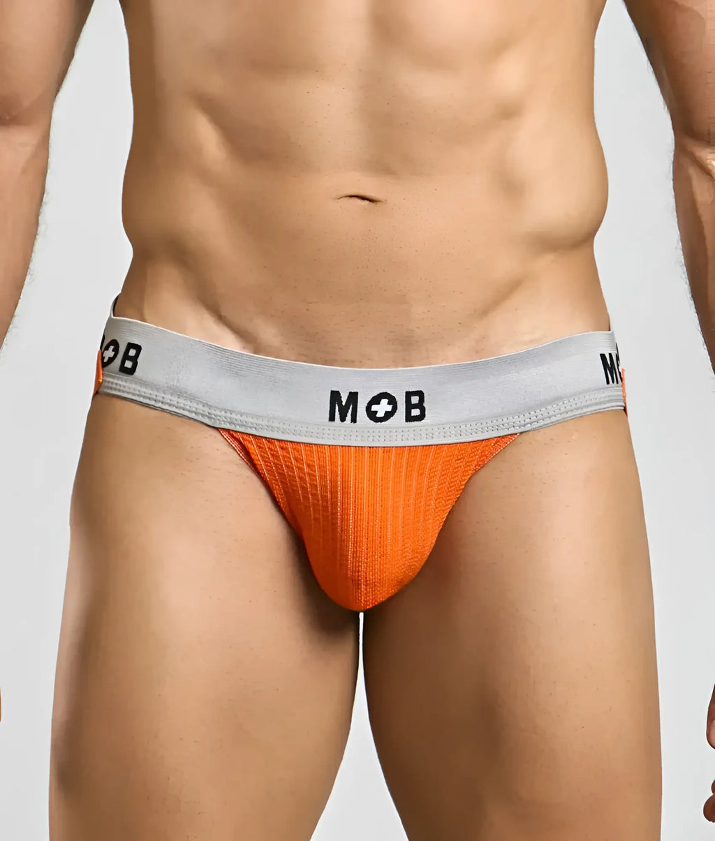 Orange textured briefs with a gray waistband featuring the mob logo in mob classic jock 3 inches design