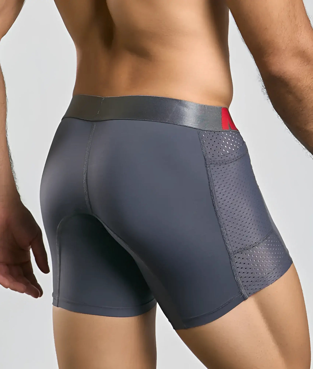 MaleBasics titanium pocket boxer brief in dark gray with perforated mesh side panel and red logo waistband detail