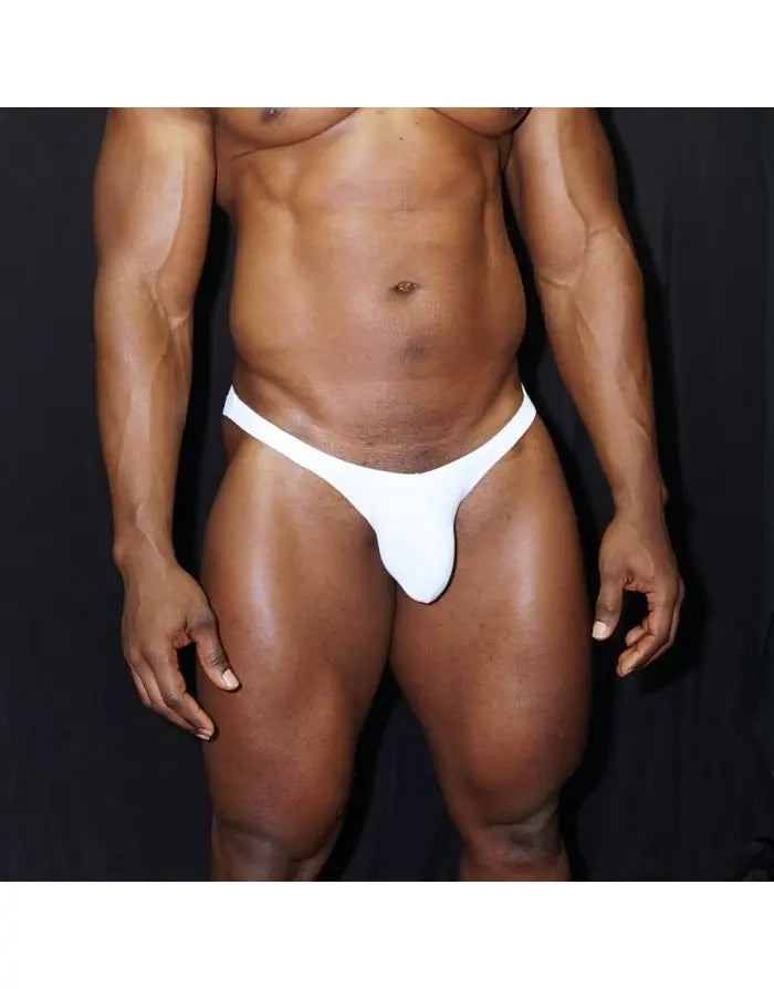 White micro bikini brief by Arroyman featuring a minimal design and snug fit shown on a model.