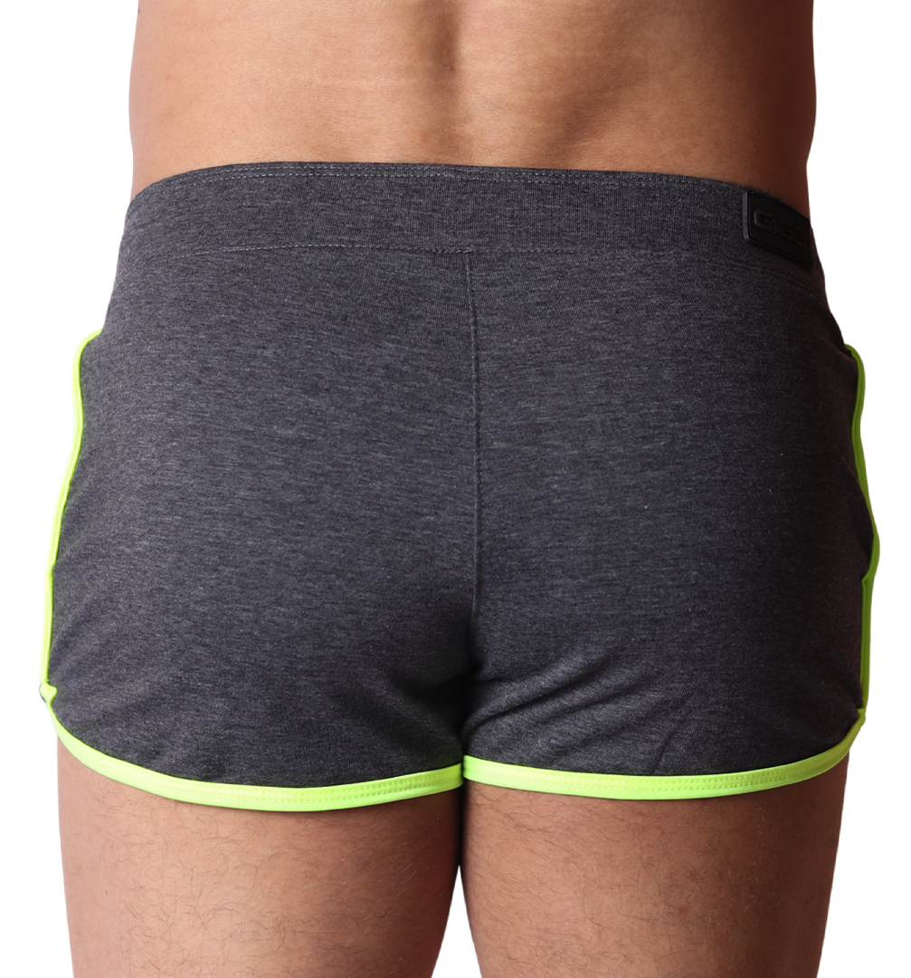 Back view of Gigo Nafts charcoal heather cotton shorts with neon yellow trim and logo patch.
