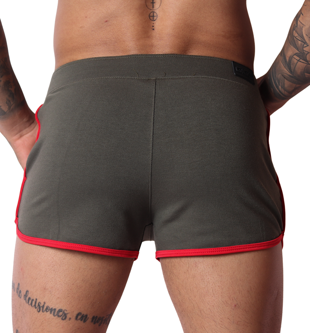 Gigo Nafts green cotton shorts with red trim, back view showing athletic style fit and branding label.