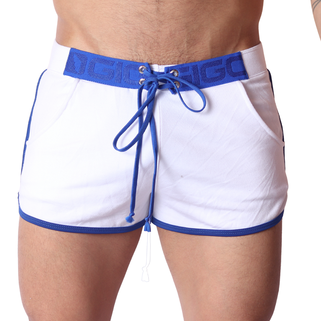 Front view of Gigo Nafts white jersey shorts with blue contrast trim, logo waistband, and lace-up drawstring closure.