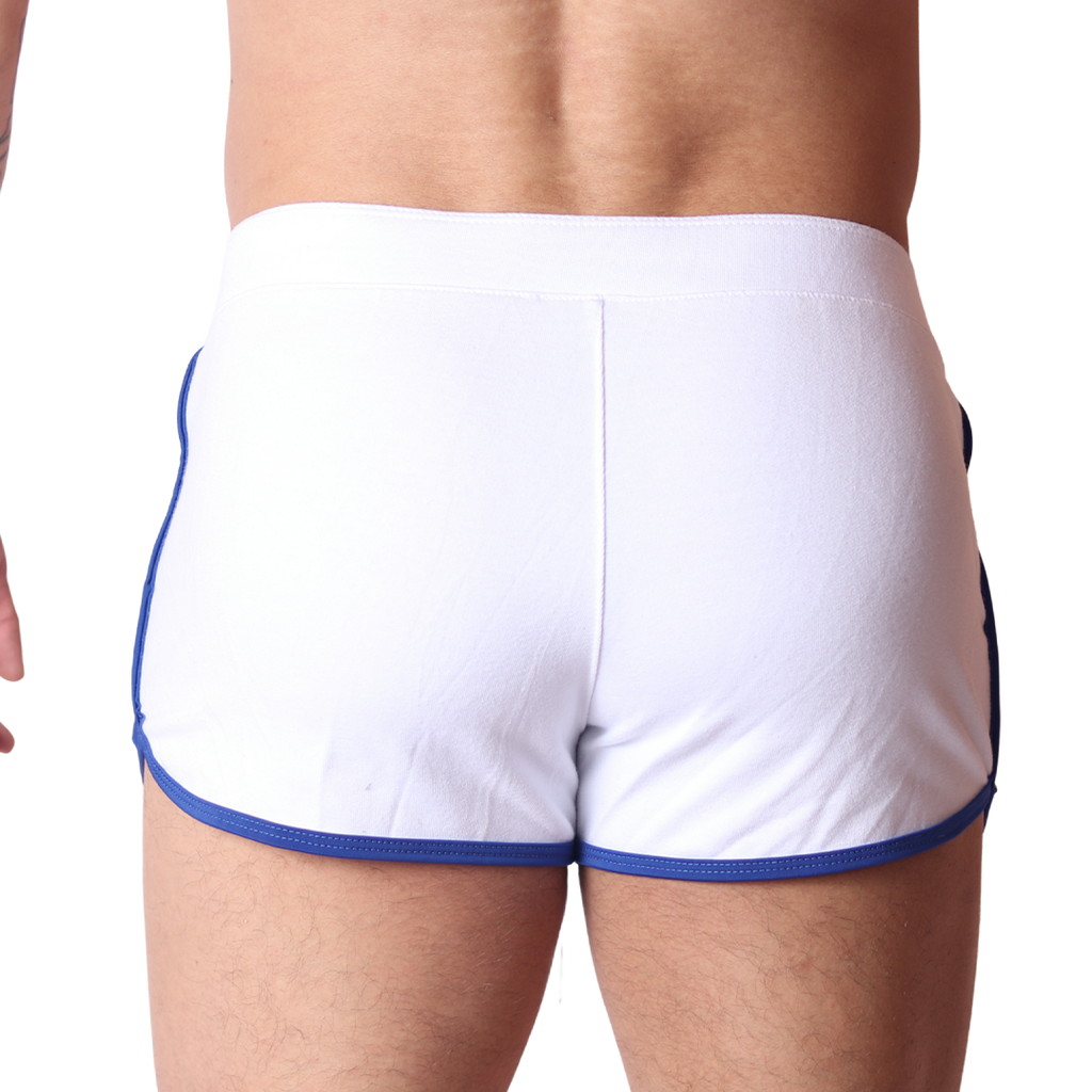 Back view of Gigo Nafts white cotton shorts with blue trim and elastic waistband.