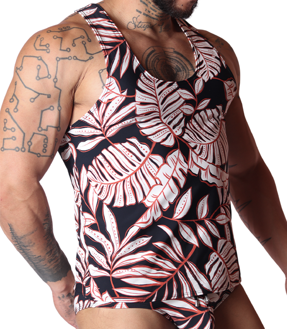 Gigo Prisma black tank top with white and red tropical leaf print, front side view on a tattooed model.
