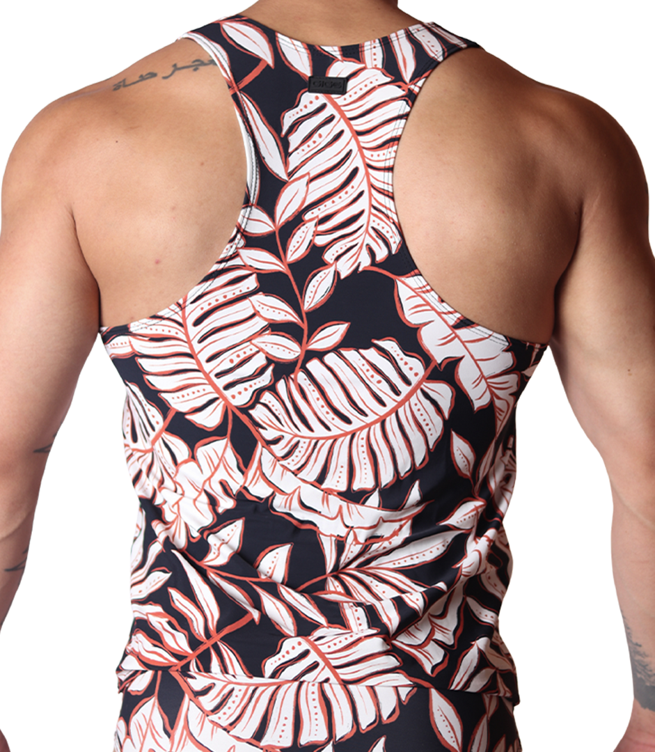 Back view of Gigo Prisma tank top with black and orange tropical leaf print in soft, stretchy athletic fabric.