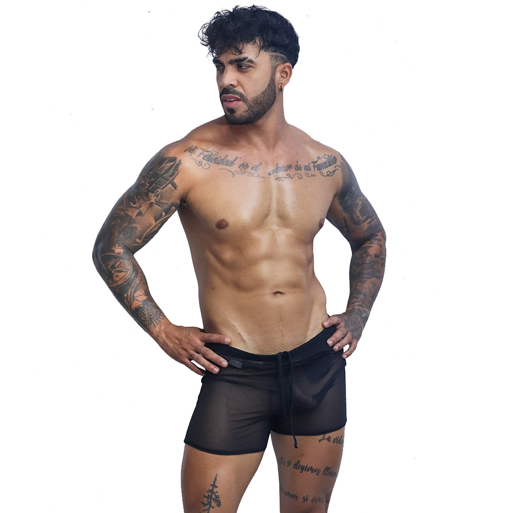 Front view of Gigo Spectrum black sheer mesh hot shorts with drawstring on a tattooed male model.
