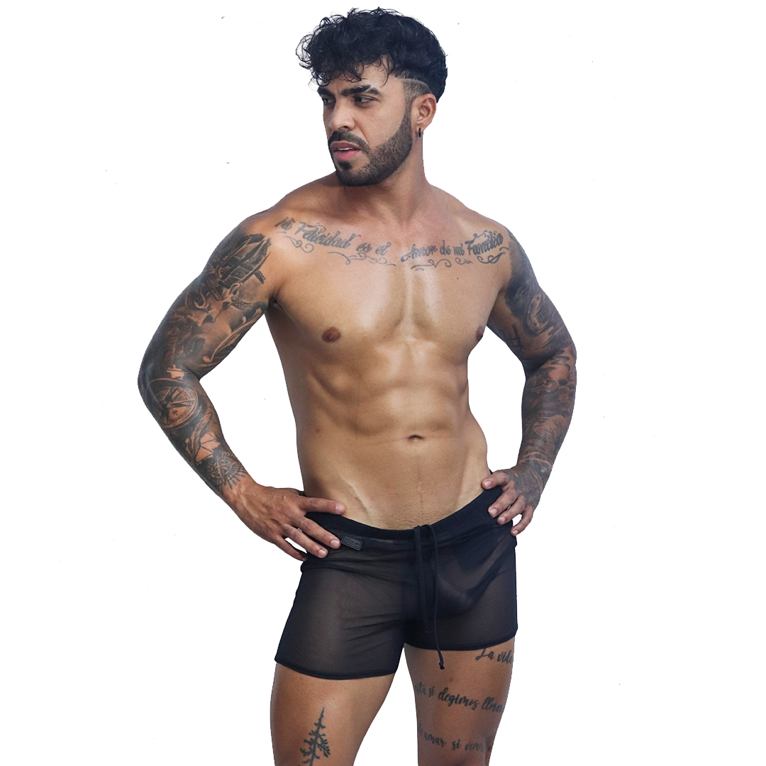 Front view of Gigo Spectrum black sheer mesh hot shorts with drawstring on a tattooed male model.